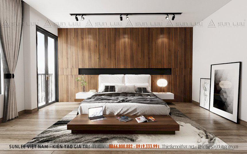 Phòng ngủ sử dụng các chi tiết ốp gỗ, vải và đèn treo độc đáo